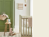 Little Greene - Green Stone Pale 268 op de muur in een babykamer