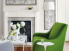 Little Greene behang Gustav - Throphy toegepast in kaders op de muur in de woonkamer met een openhaard
